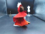 nancy ann brunette red outfit cape a